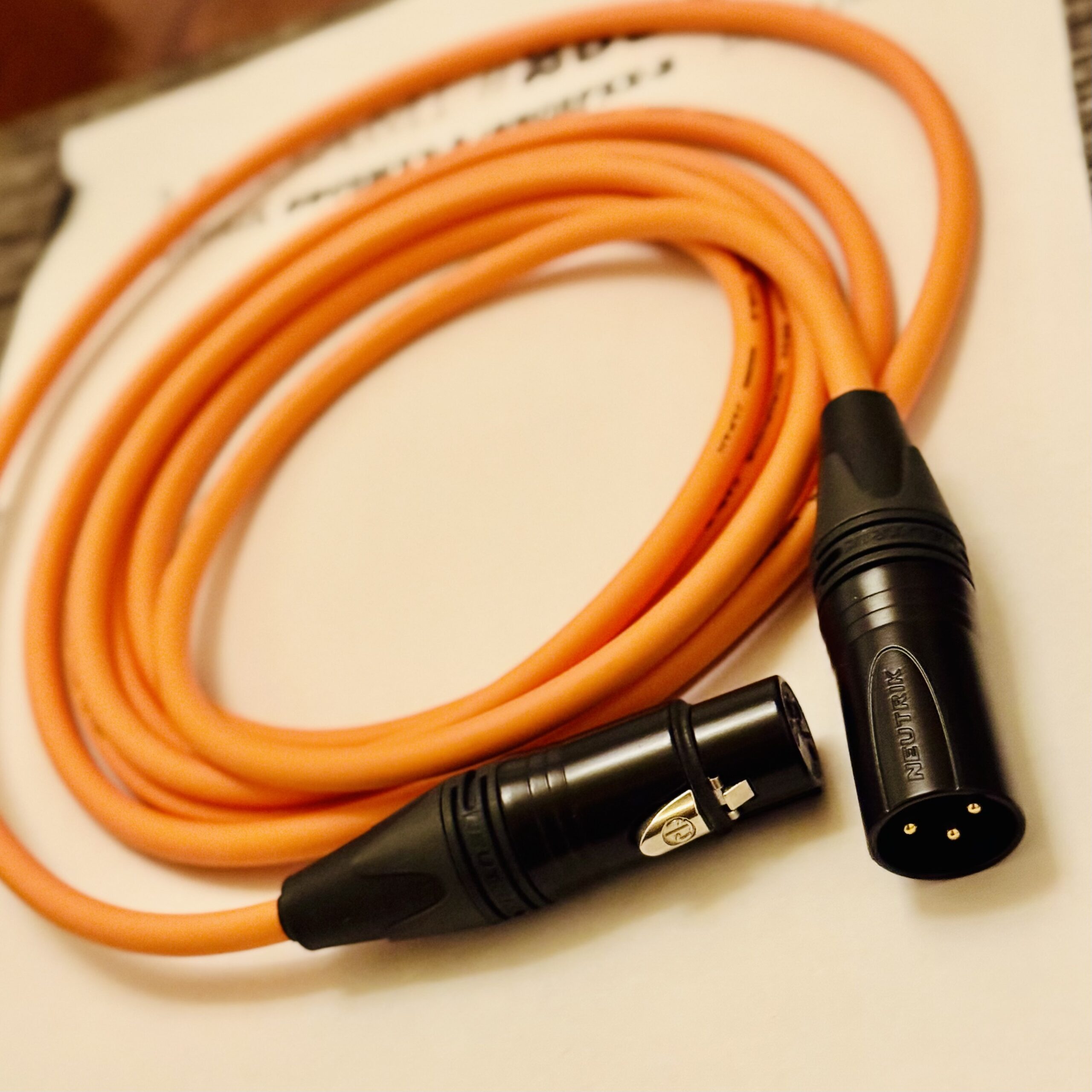 Mogami 2534 Orange XLR microphone cable with Neutrik NC3MXX-B and NC3FXX-B connectors